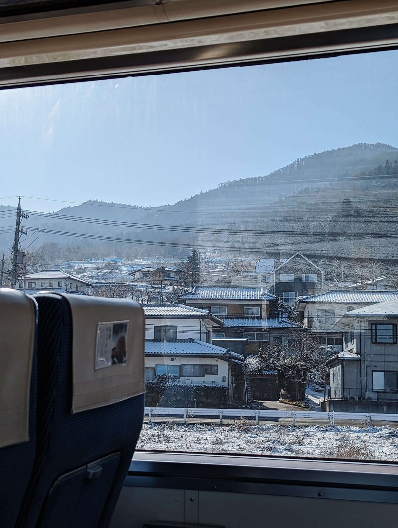 train ride through a snowy nagano