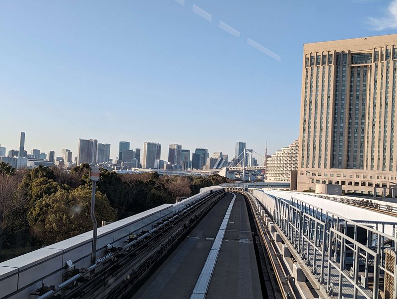 odaiba rainbow bridge seen from the yurikamome elevated train